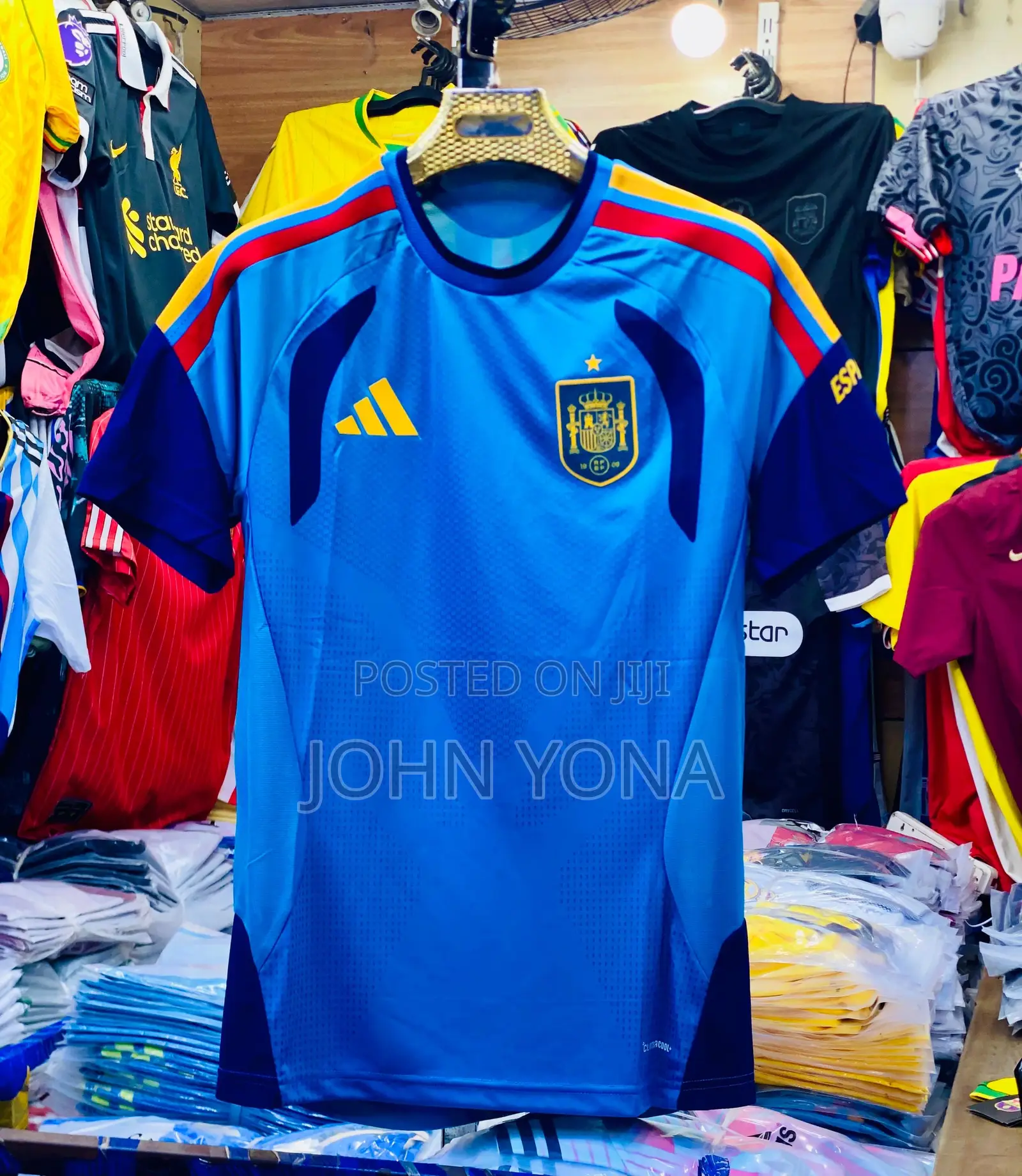 Spain 2026 Training Jersey in Bold Aqua.