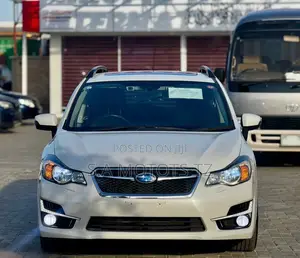 Subaru Impreza 2.0i Limited PZEV 4dr Hatchback AWD (2.0L 4cyl CVT) 2015