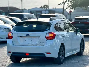 Subaru Impreza 2.0i Limited PZEV 4dr Hatchback AWD (2.0L 4cyl CVT) 2015