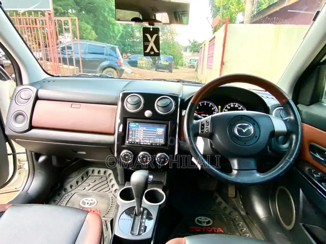 Mazda Verisa 2009 Pearl