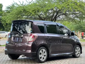 Toyota Ractis 2010 Maroon