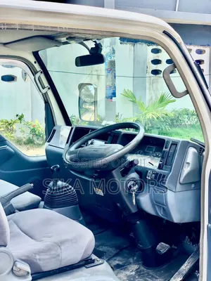 Isuzu 2 Toms Truck