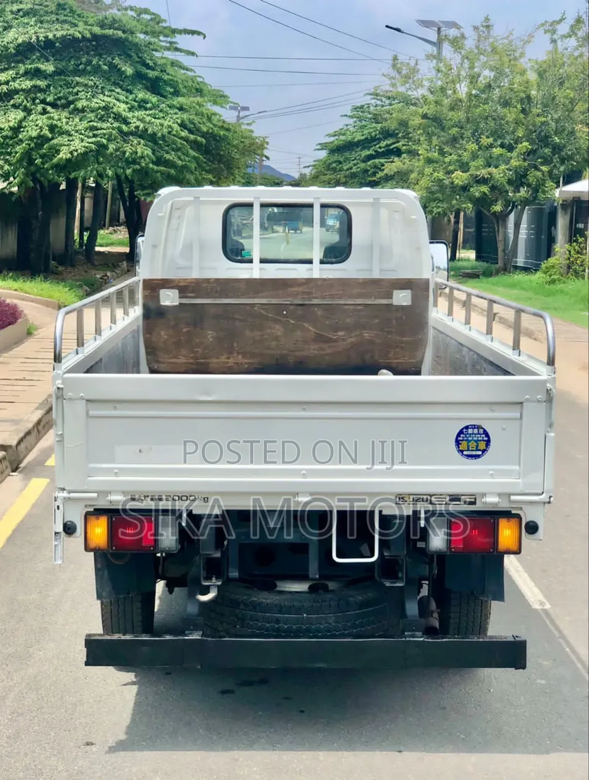 Isuzu 2 Toms Truck