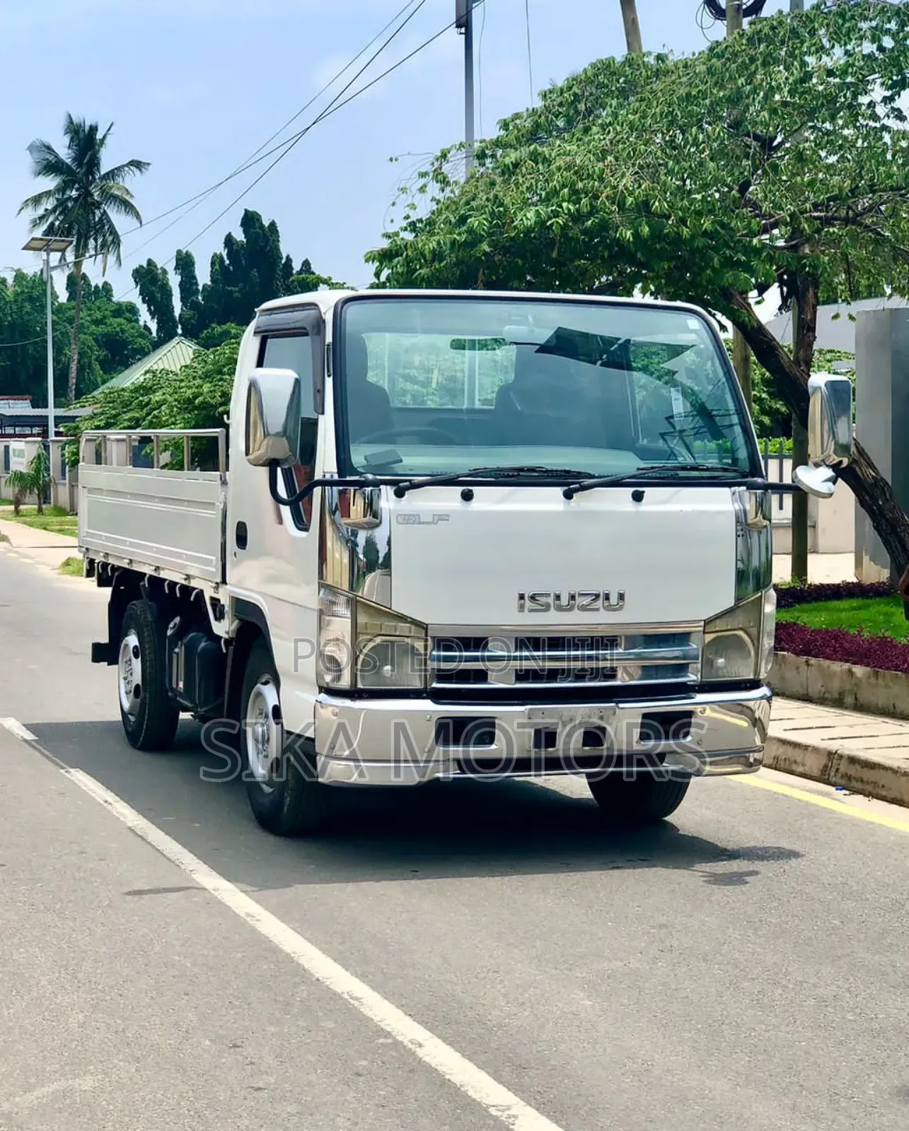 Isuzu 2 Toms Truck