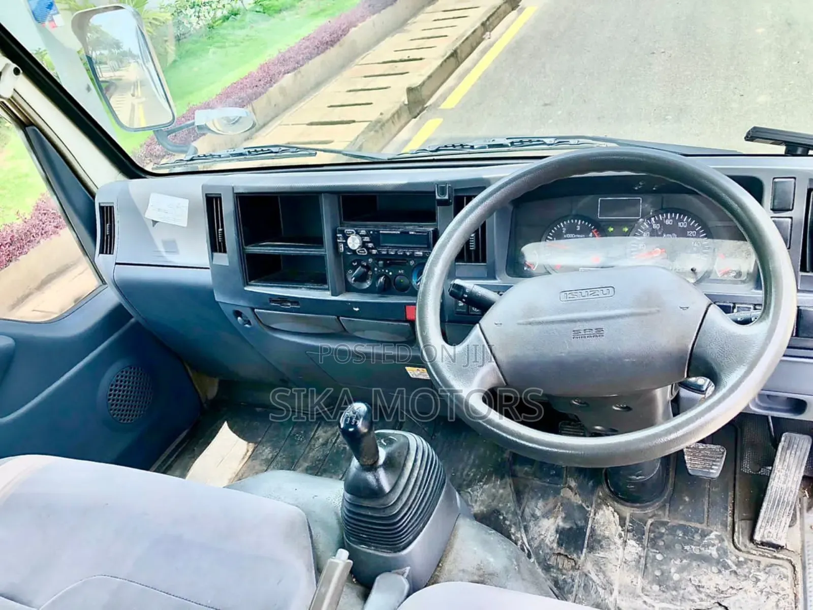 Isuzu 2 Toms Truck
