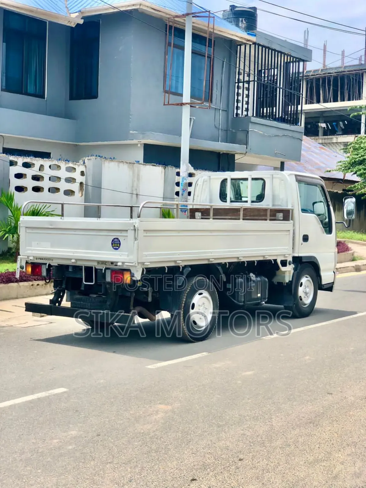 Isuzu 2 Toms Truck