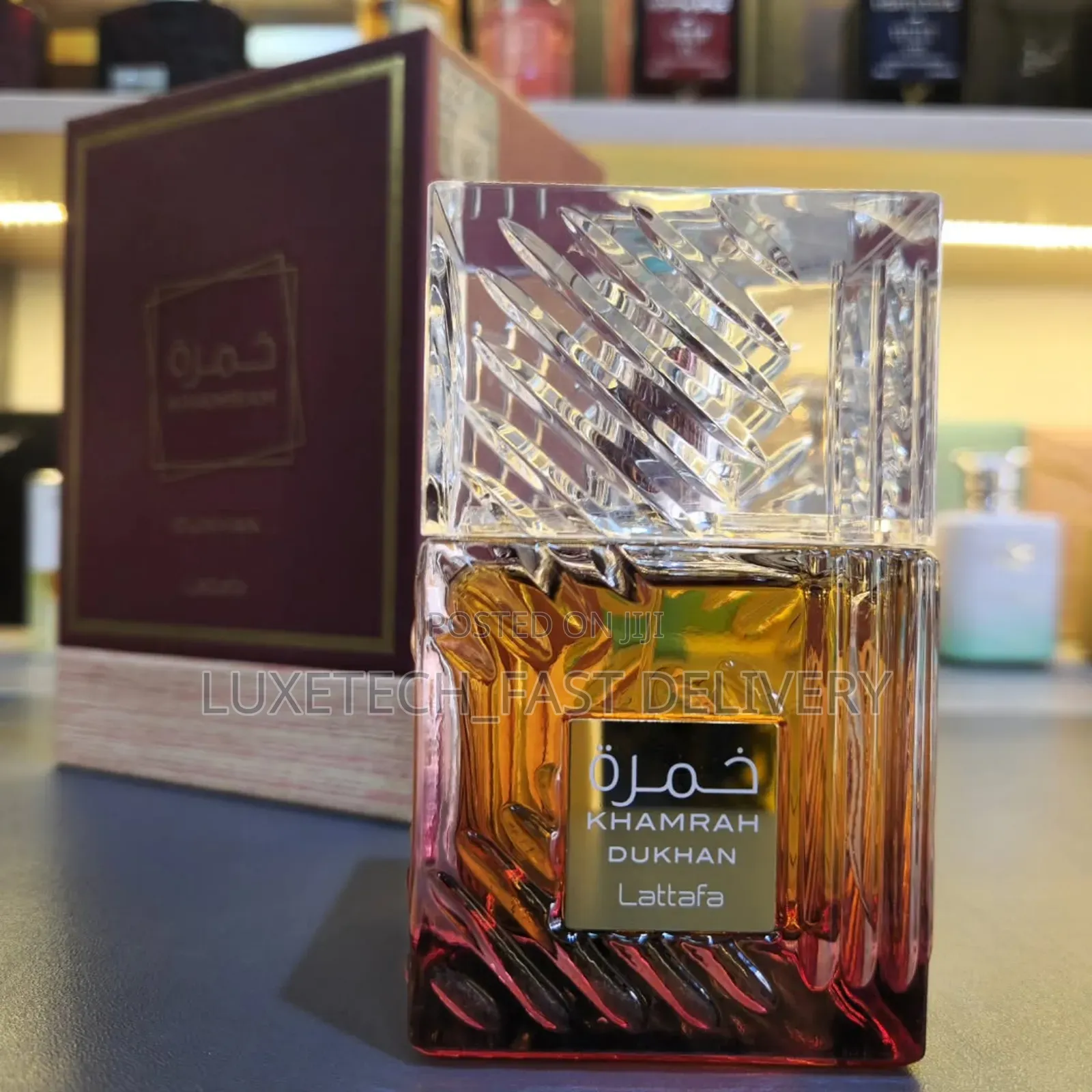 Lattafa Khamrah Dukhan Eau De Parfum, a 100ml Unisex Fragrance