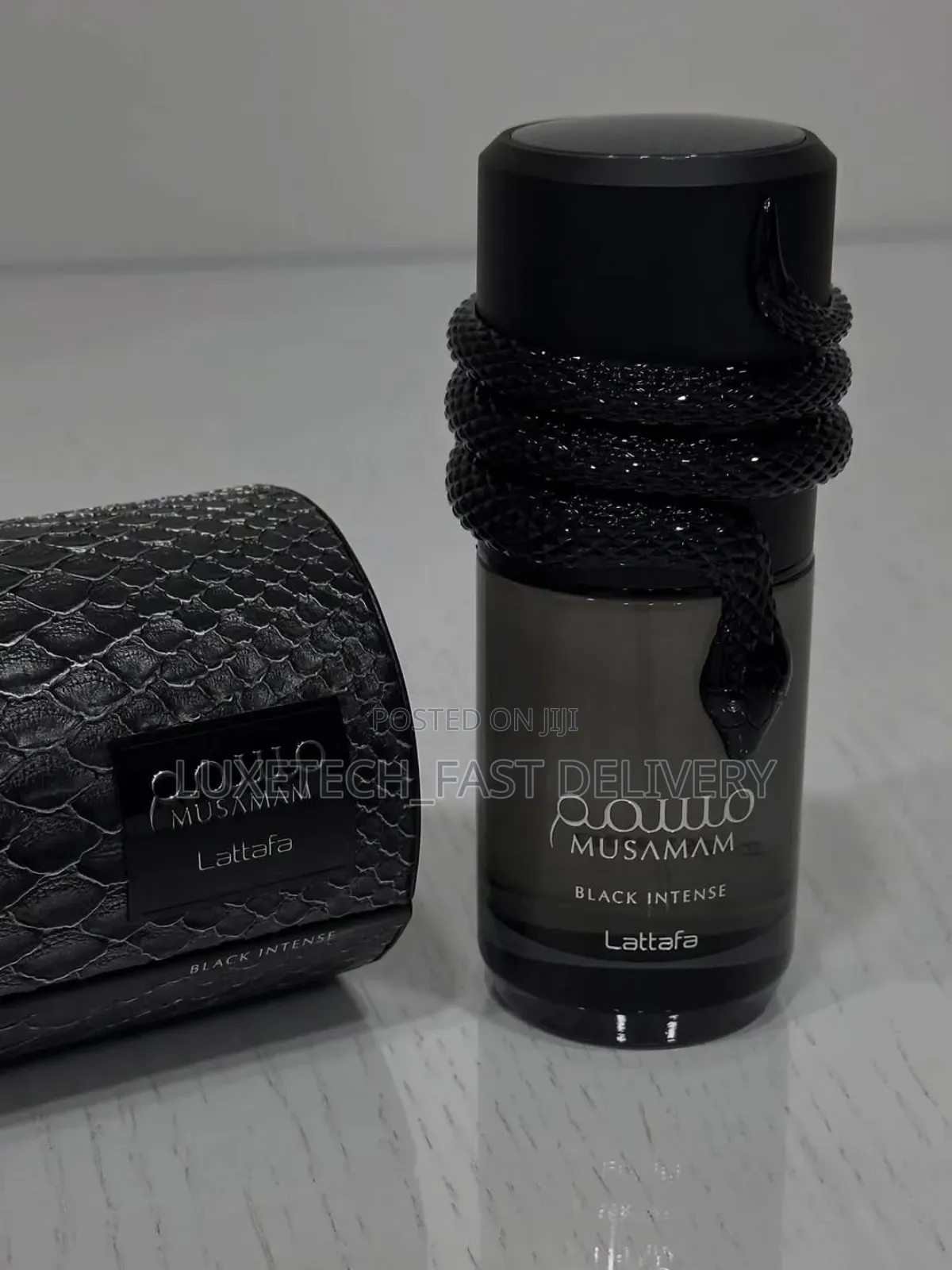 Musamam Black Intense Eau De Parfum, a Unisex Woody Aromatic Fragrance