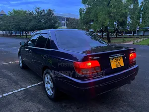 Toyota Carina 1.5 FWD Sedan 2000 Purple