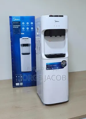 Midea Top-Loading Water Dispenser With a Refrigerator Cabinet.