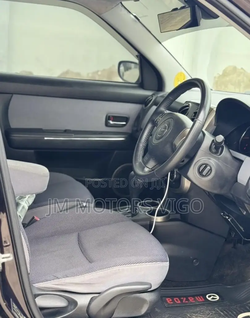 Mazda Verisa 2009 Burgundy
