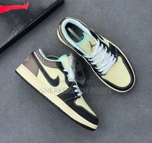 The Nike Air Jordan 1 Low Se in the “ Coconut Milk Black Muslin “