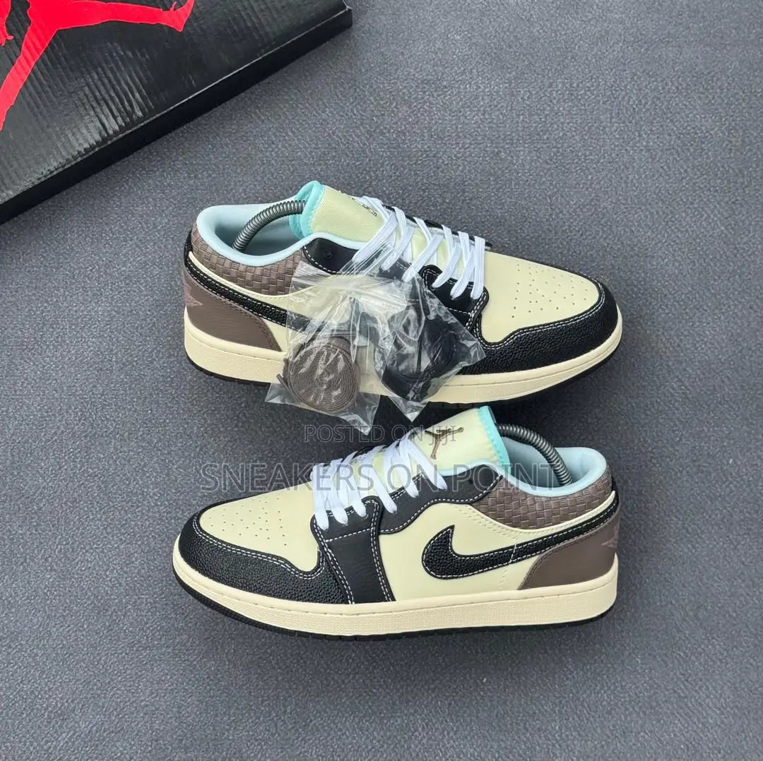 The Nike Air Jordan 1 Low Se in the “ Coconut Milk Black Muslin “