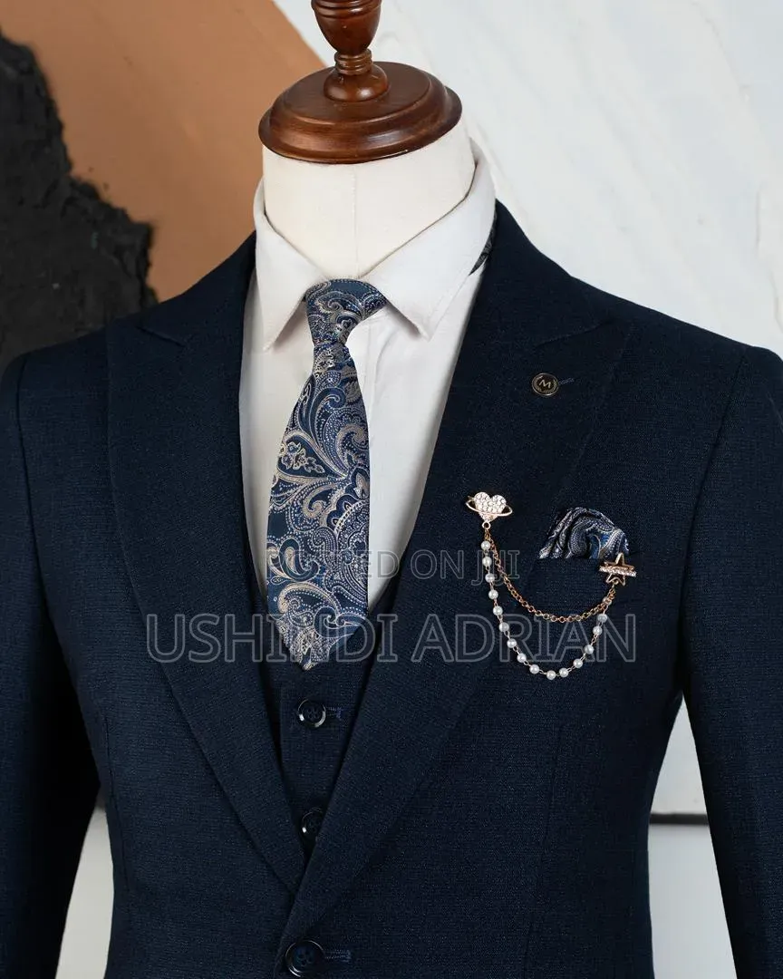 Men Suit(Three Piece) •Price: 200,000/= TSH