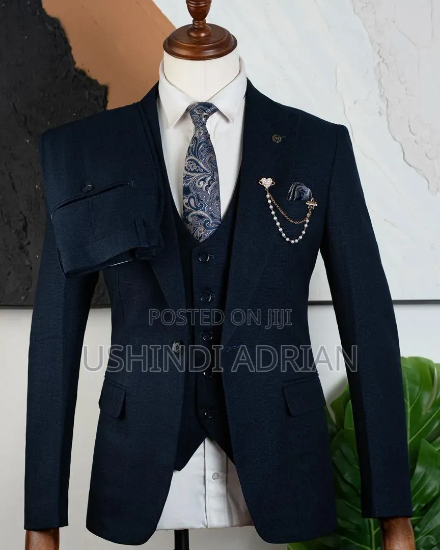 Men Suit(Three Piece) •Price: 200,000/= TSH