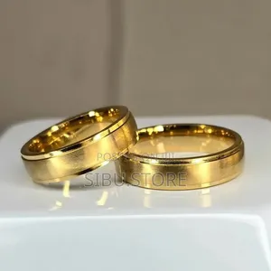 Will You Marry Him/Her. Gold Rings