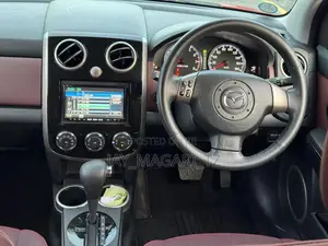Mazda Verisa 2010 Red