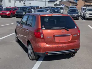 Mazda Verisa 2009 Orange
