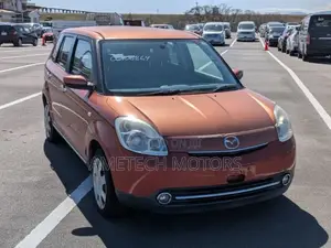 Mazda Verisa 2009 Orange
