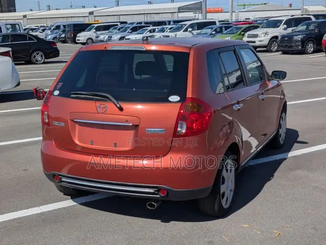 Mazda Verisa 2009 Orange