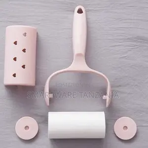 Pink Lint Roller With Refill Roll and Heart Design Cap