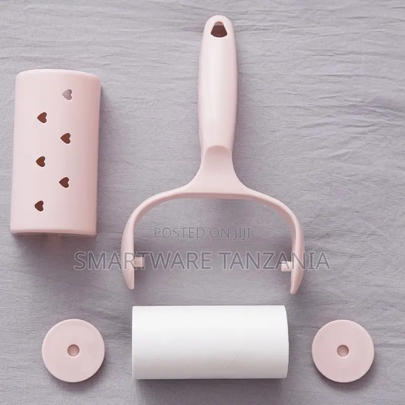 Pink Lint Roller With Refill Roll and Heart Design Cap