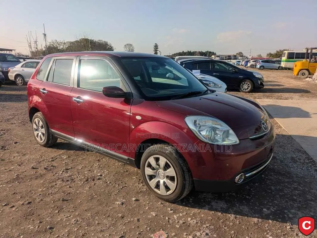 Mazda Verisa 2013 Red