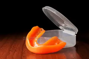 Orange Boil and Bite Sports Mouthguard With Clear Hinged Carry Case