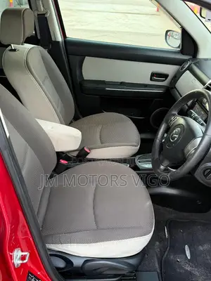 Mazda Verisa 2011 Red