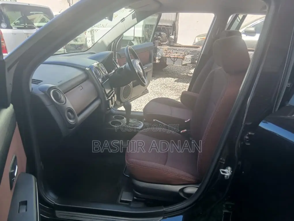 Mazda Verisa 2010 Maroon