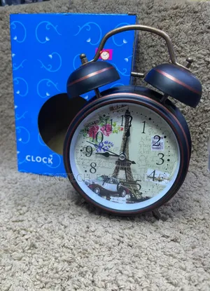 Vintage-Style Twin-Bell Alarm Clock Features a Nostalgic Eiffel Tower