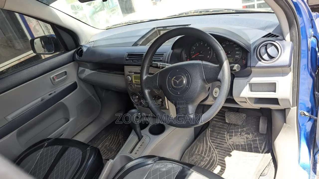 Mazda Demio 2009 Blue