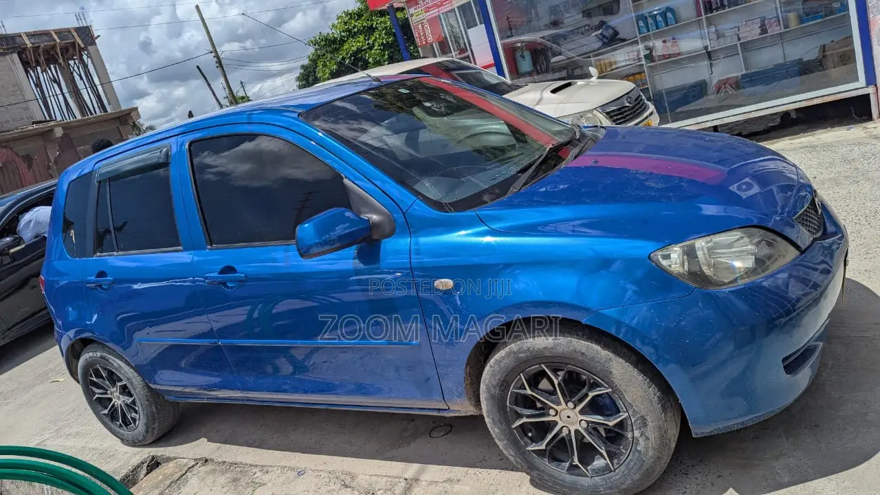 Mazda Demio 2009 Blue
