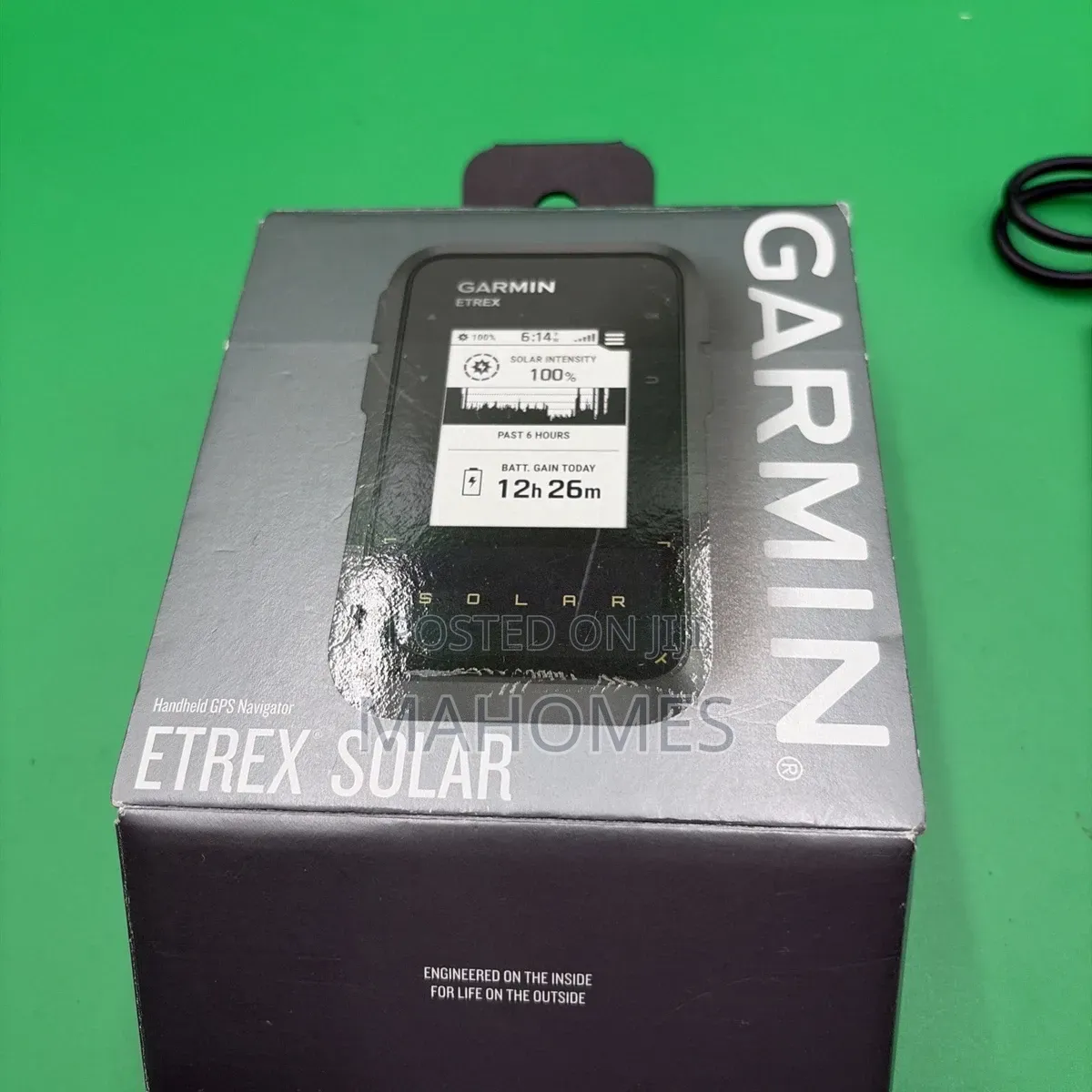 Garmin E Trex Solar Handheld GPS
Navigator in Its Packaging