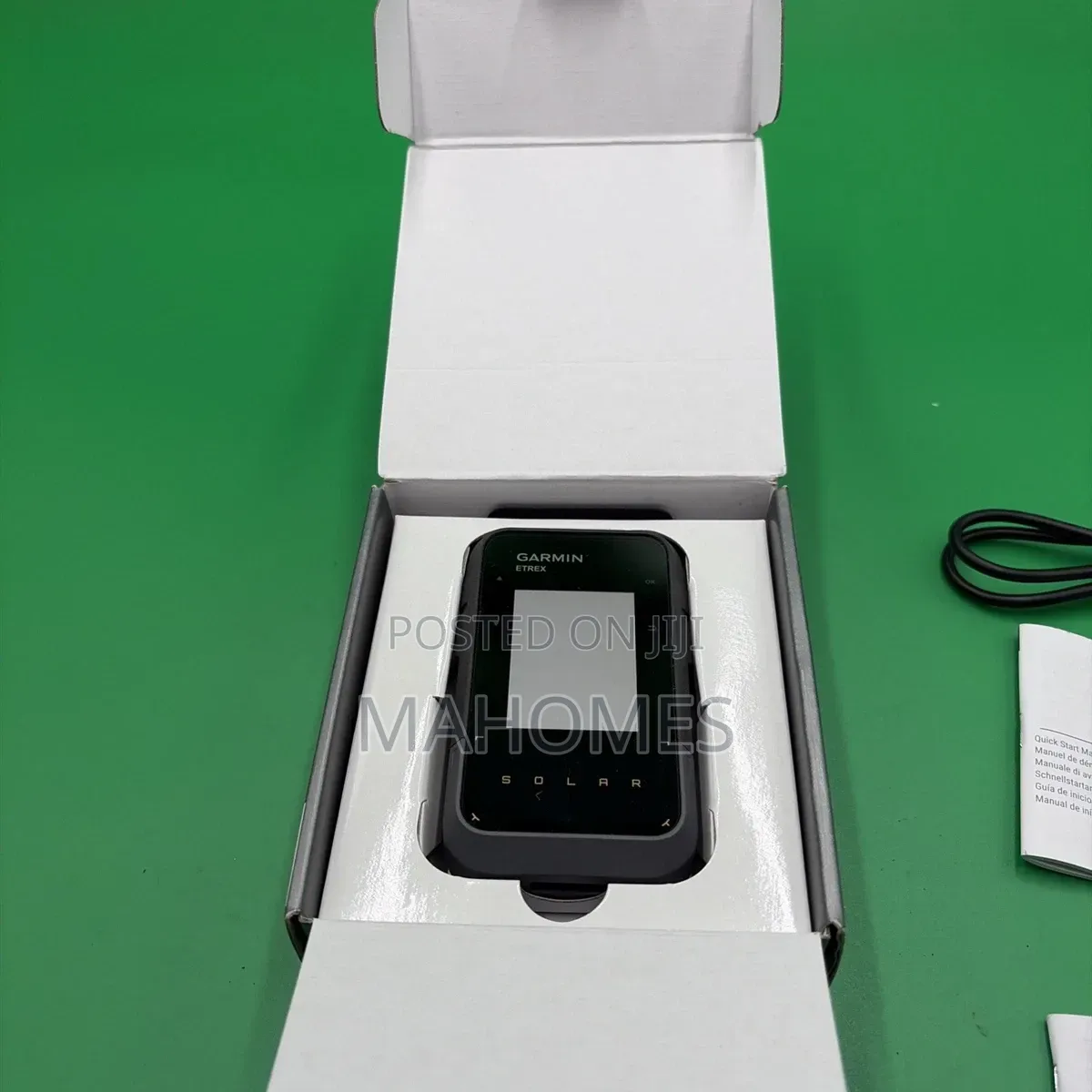 Garmin E Trex Solar Handheld GPS
Navigator in Its Packaging
