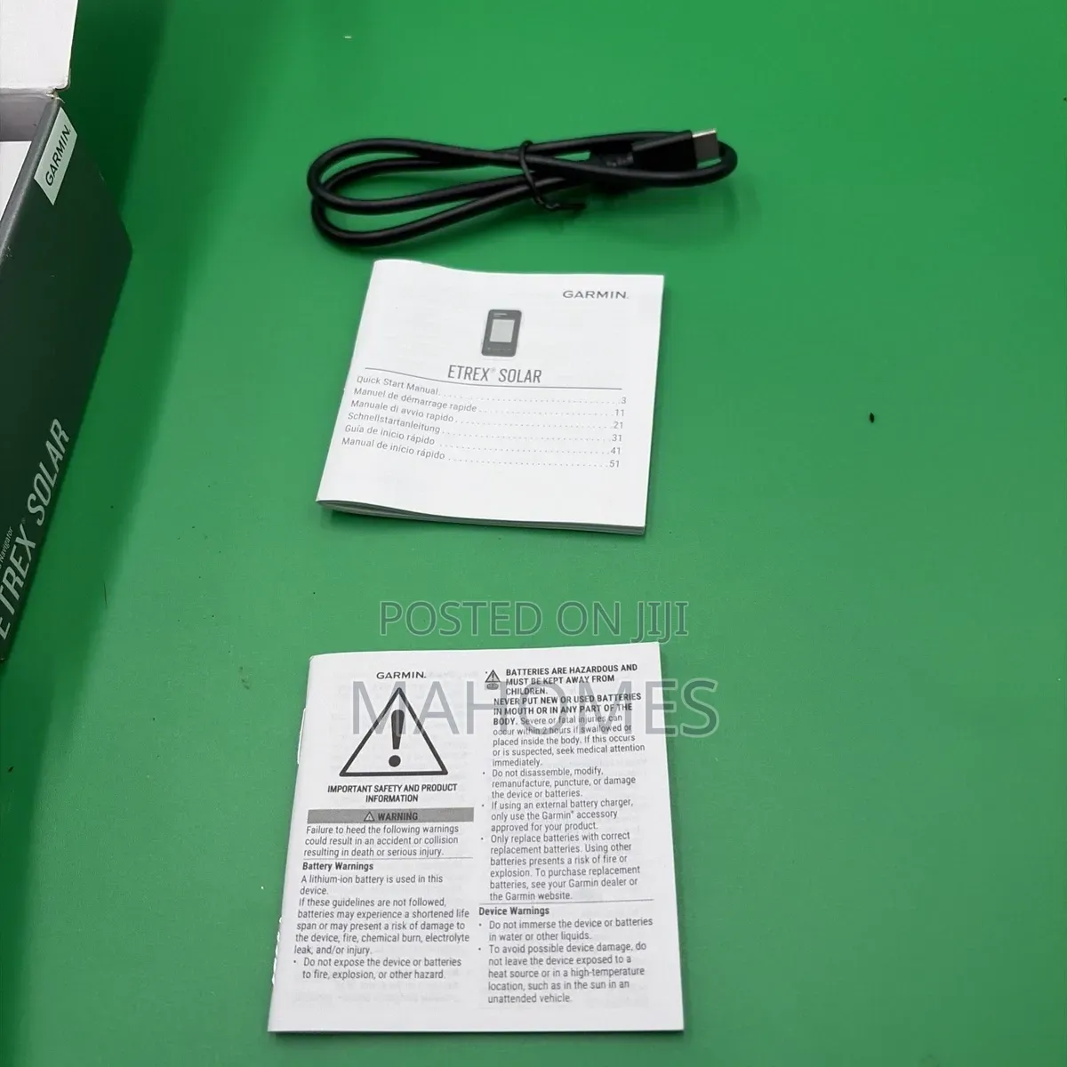 Garmin E Trex Solar Handheld GPS
Navigator in Its Packaging