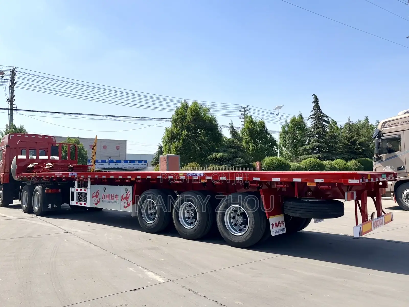 China Semi Trailer Factory 3axle 60ton Flatbed Trailer Tanzania
