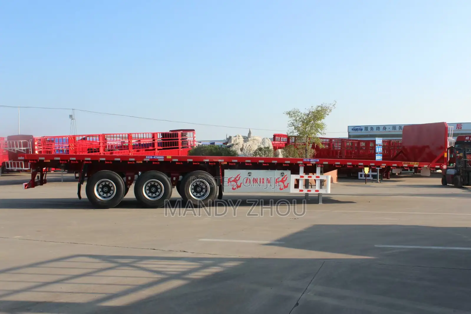 China Semi Trailer Factory 3axle 60ton Flatbed Trailer Tanzania