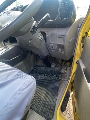 Toyota Coaster 2004 Yellow
