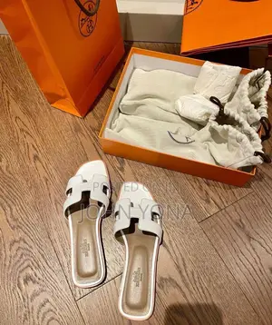 Hermes Tending Shoes