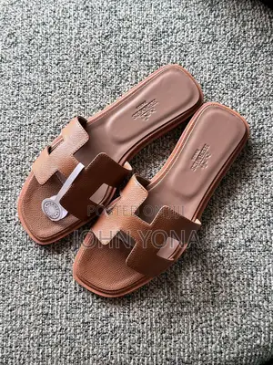 Hermes Tending Shoes