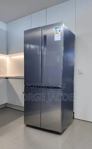 Stainless Steel TCL 520l Fridge With a Digital Temperature Display.