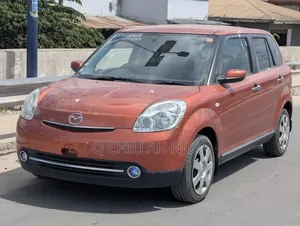Mazda Verisa 2009 Red