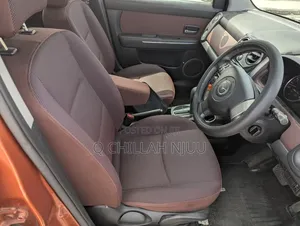 Mazda Verisa 2009 Red