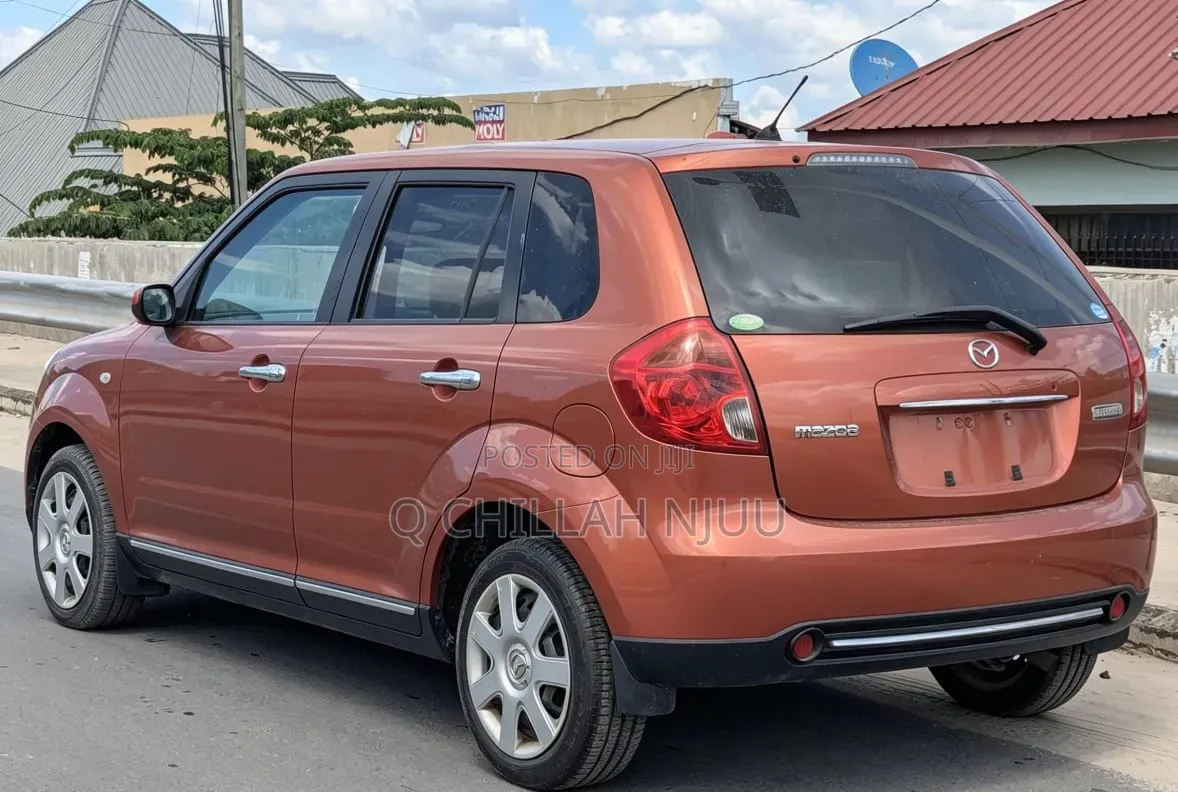 Mazda Verisa 2009 Red