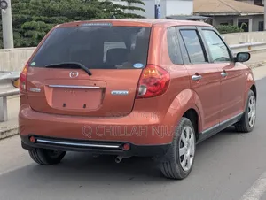 Mazda Verisa 2009 Red