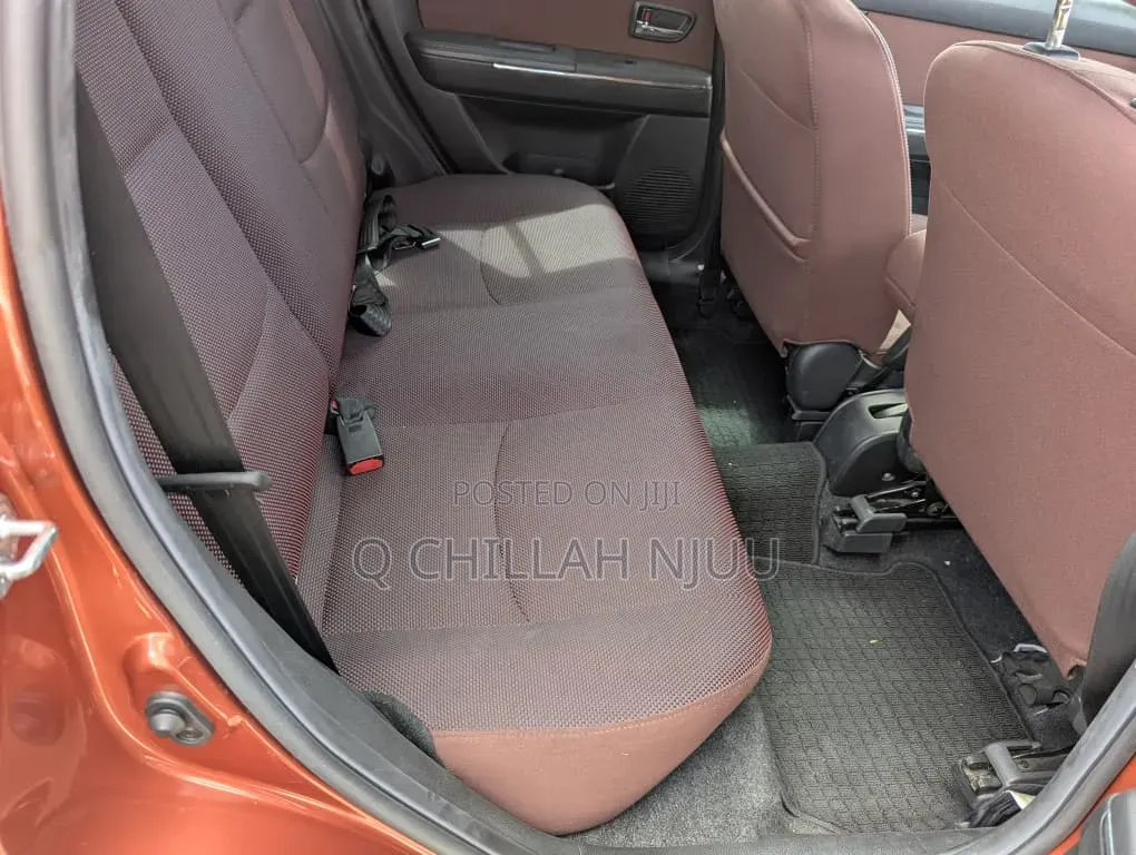 Mazda Verisa 2009 Red