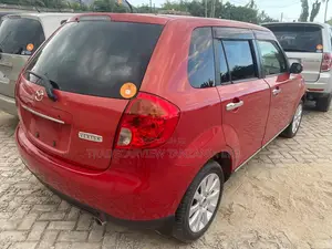 Mazda Verisa 2011 Red