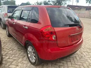 Mazda Verisa 2011 Red