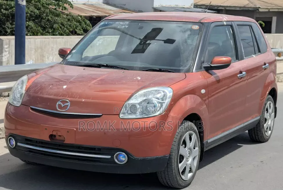 Mazda Verisa 2009 Red